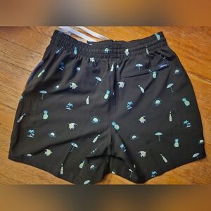 Chubbies Black Swim Trunks with Blue Tropical Print